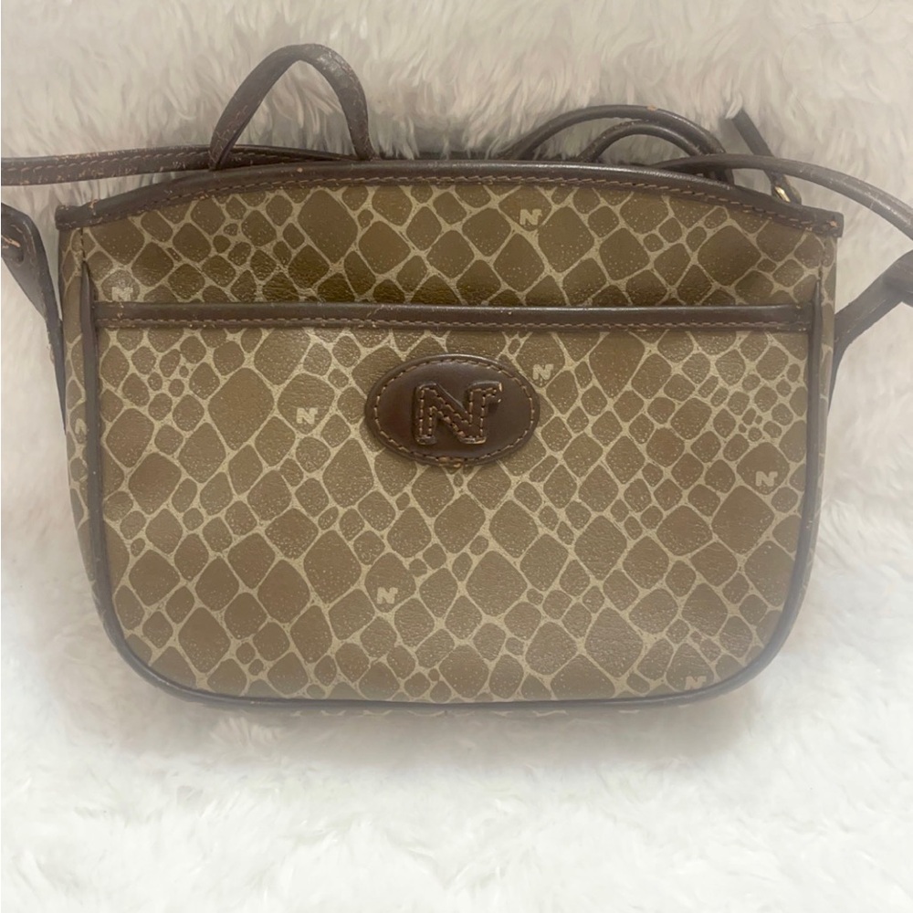 Nina Ricci Vintage crossbody bag. With scratches inside and on straps.
